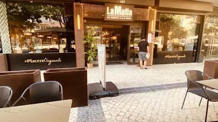 La Mafia Se Sienta A La Mesa, 里斯本